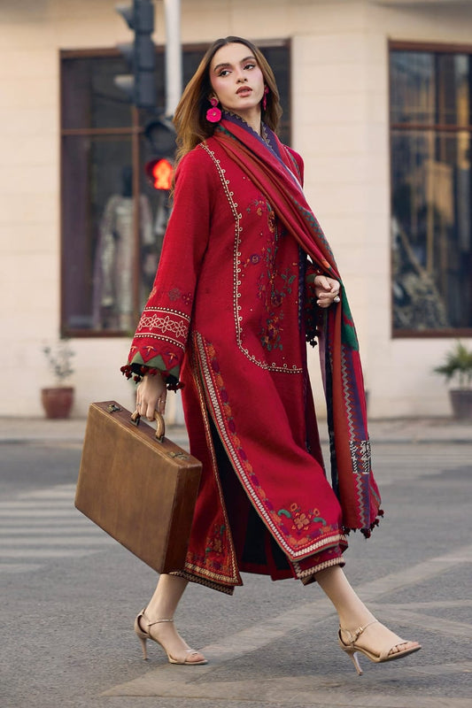 Model wearing a 3-piece maroon embroidered Pakistani suit