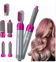 Electric hair styler kit with air wrap barrels and smoothing brush.