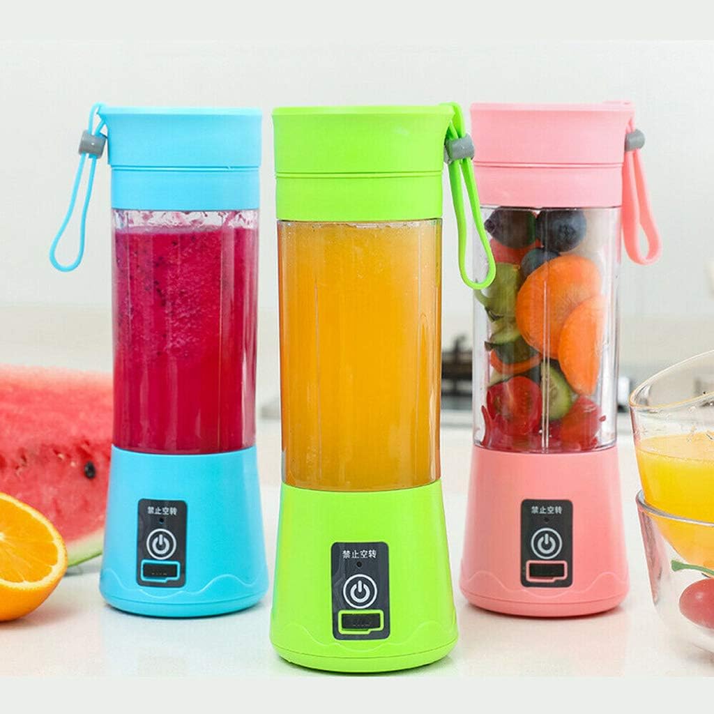 Three portable blenders in blue, green, and pink with fruits and juice inside on a white background.