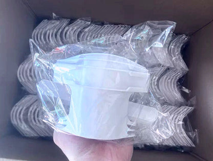 Detail of non-slip plastic clenching system to protect bedsheet fabric.