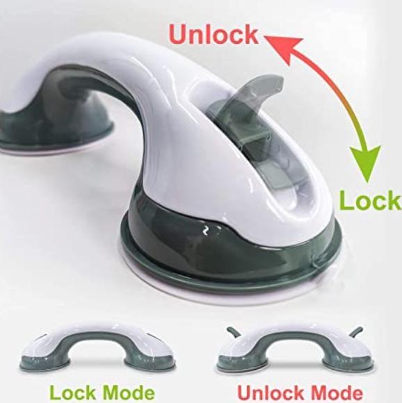 Strong suction cup safety handle in grey and white installed on bathroom tiles