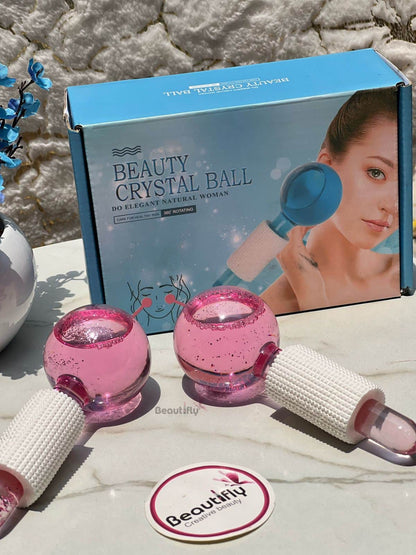 Facial ice globes in a box with protective handles for easy grip.