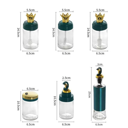 Close-up of Leak-Proof Oil Dispensers and Golden Finished Spice Containers