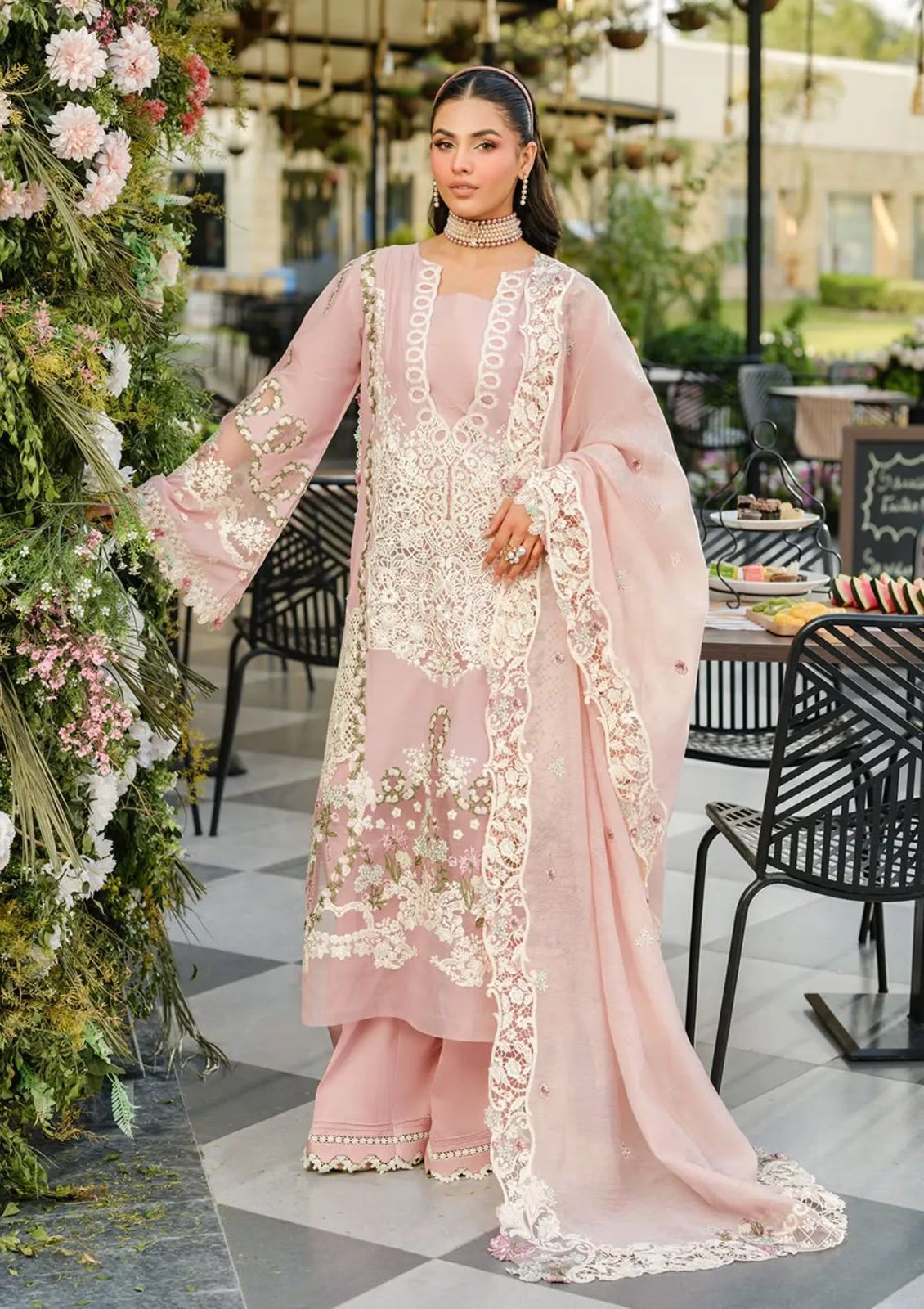 Blush pink luxury suit with heavy white lace floral embroidery on the front and sleeves."