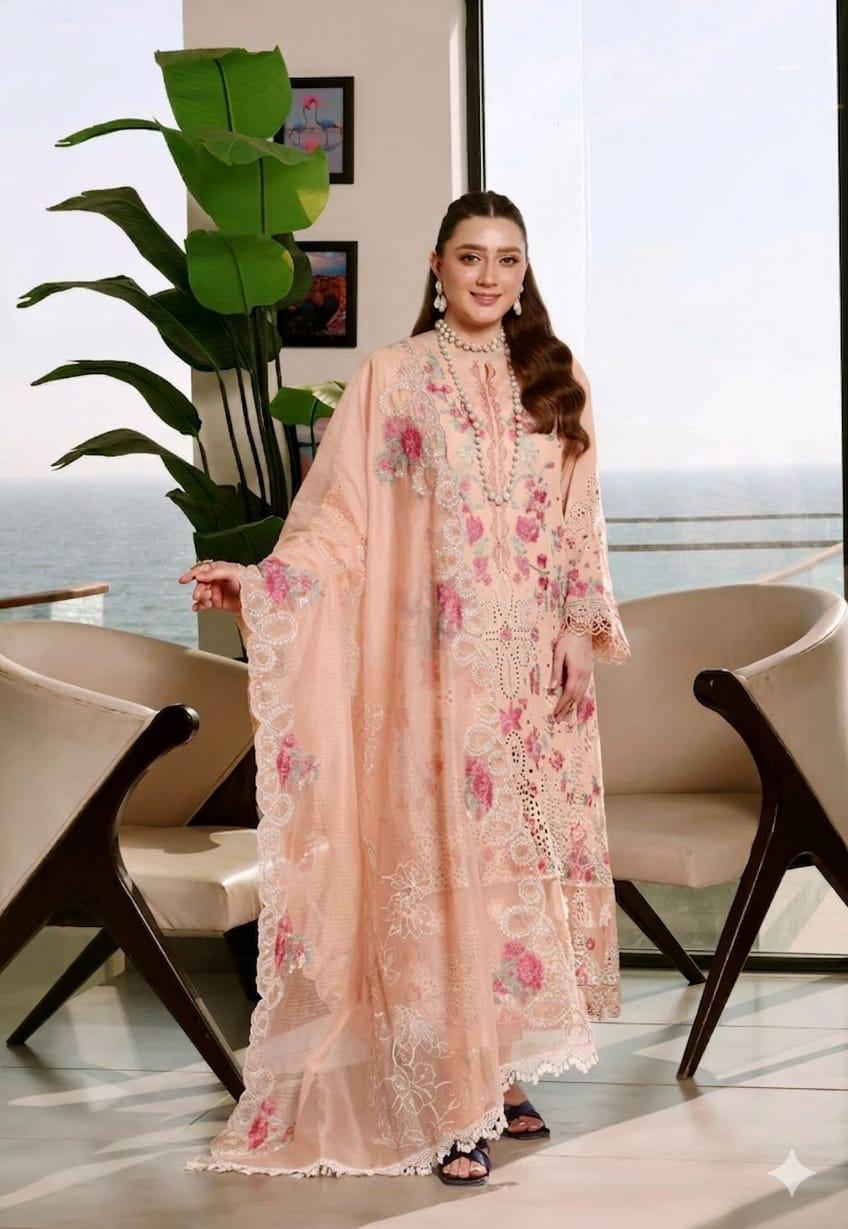 Full view of a model wearing a peach embroidered Chikankari 3-piece suit.