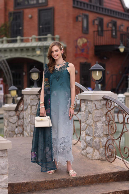 Model in a teal and grey ombre embroidered chiffon suit with cutwork daman.