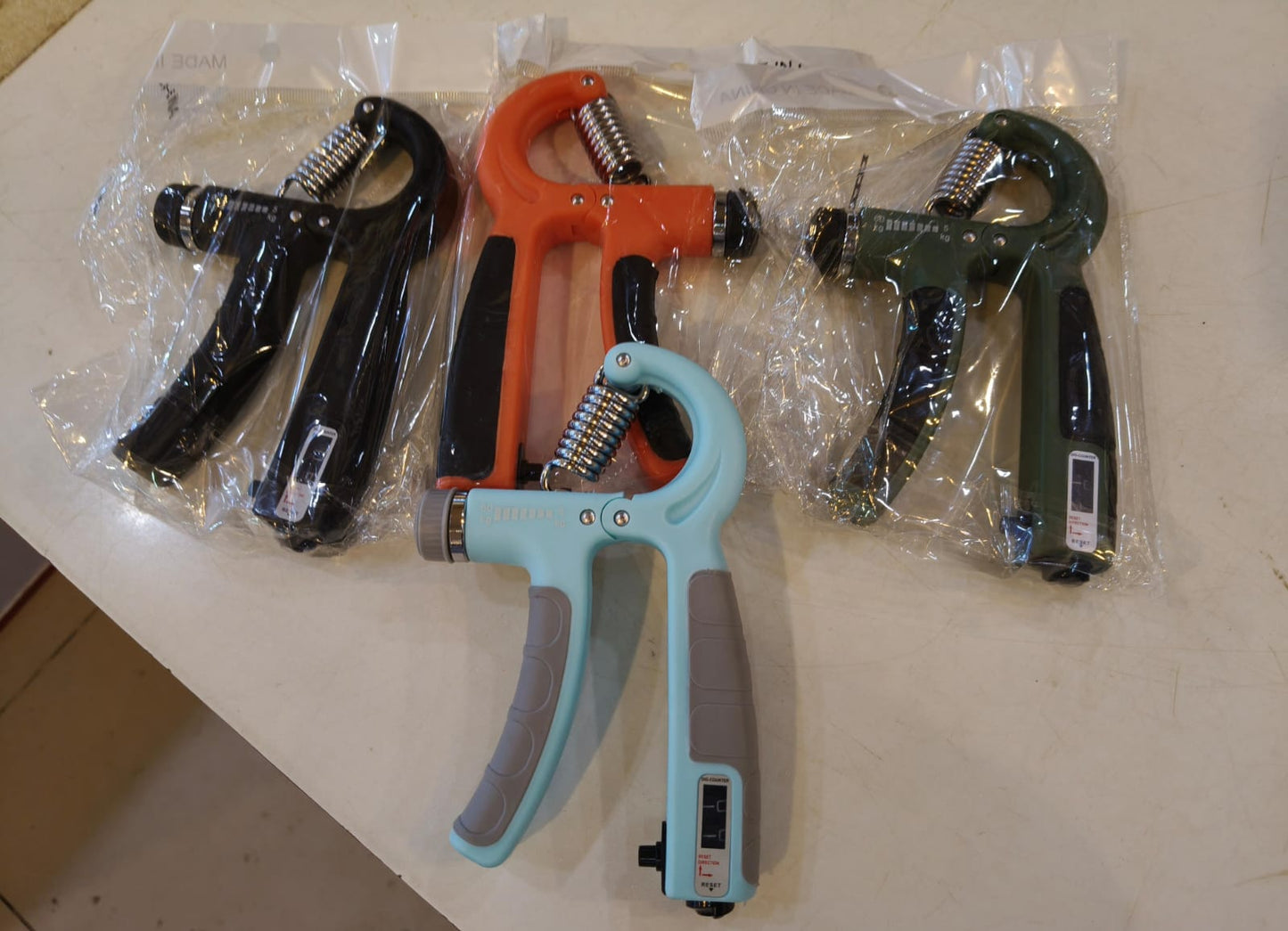 Hand grip strengthener with four other grip trainers 