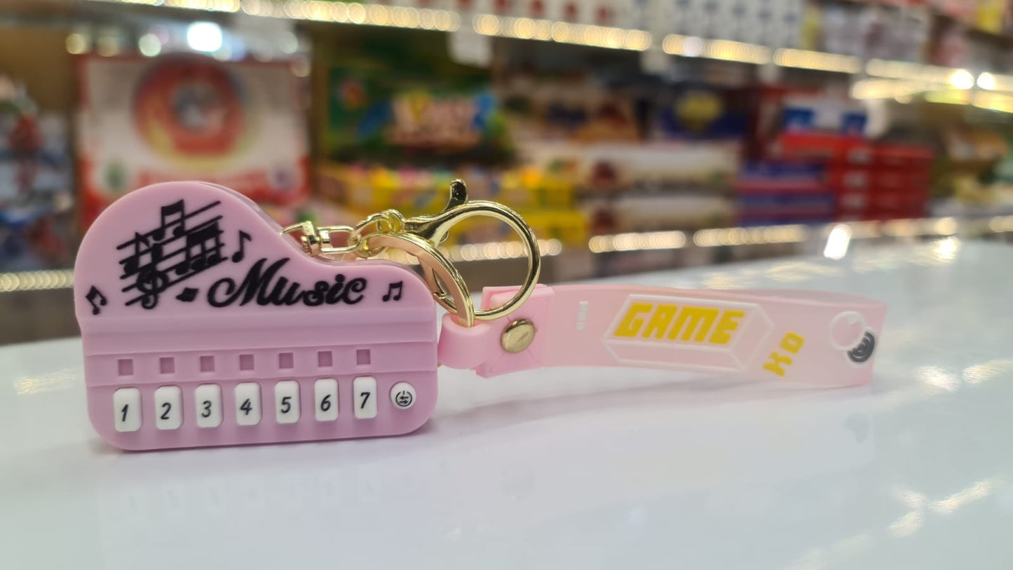 Mini Playable Piano Keychain Pocket Musical Toy with Real Sound