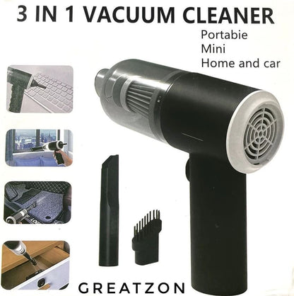 Mini wireless vacuum cleaner cleaning a computer keyboard.