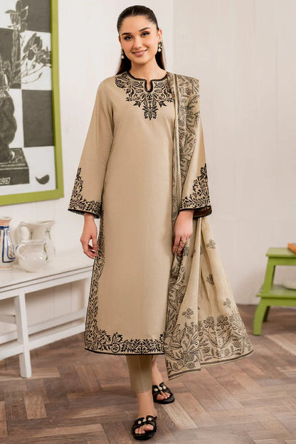 Minimalist Pakistani style beige kurta featuring black lace detailing on the neckline.
